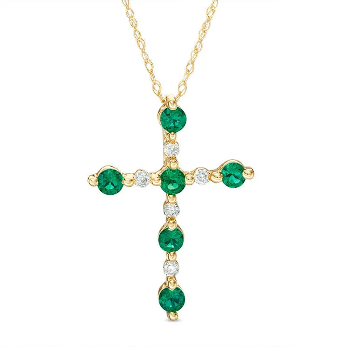 Goldia Necklaces LabCreated Emerald and Diamond Accent Cross Pendant in 10K Yellow Gold Goldia Necklaces LabCreated Emerald and Diamond Accent Cross Pendant in 10K Yellow Gold